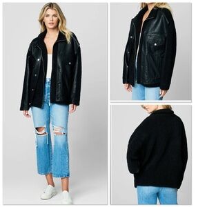 Blank NYC Edge to Edge black oversized vegan leather and Sherpa trucker jacket